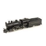 A Samhongsa Finescale 0 Gauge 2-rail American 2-6-0 steam Locomotive and Tender: finished in