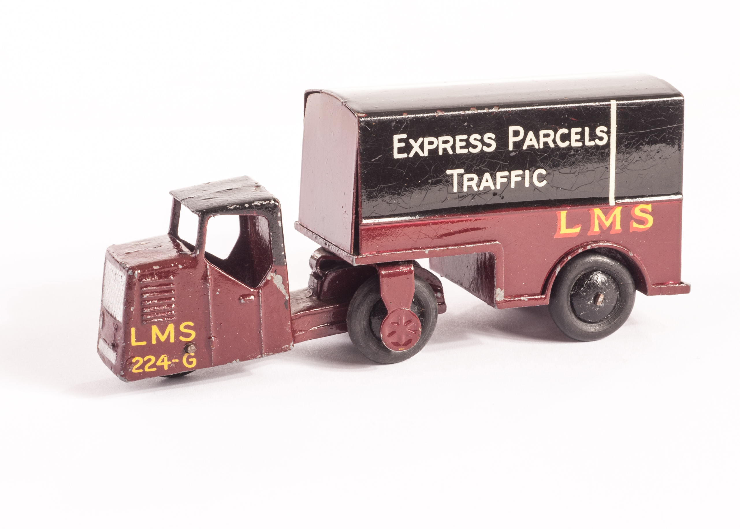 A Pre-War Dinky Toys 33r Railway Mechanical Horse & Trailer Van, L.M.S livery, maroon body, black