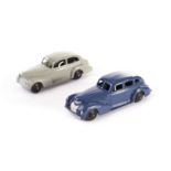 A Dinky Toys 39b Oldsmobile, stone body, black ridged hubs, 39e Chrysler Royal Sedan, dark blue