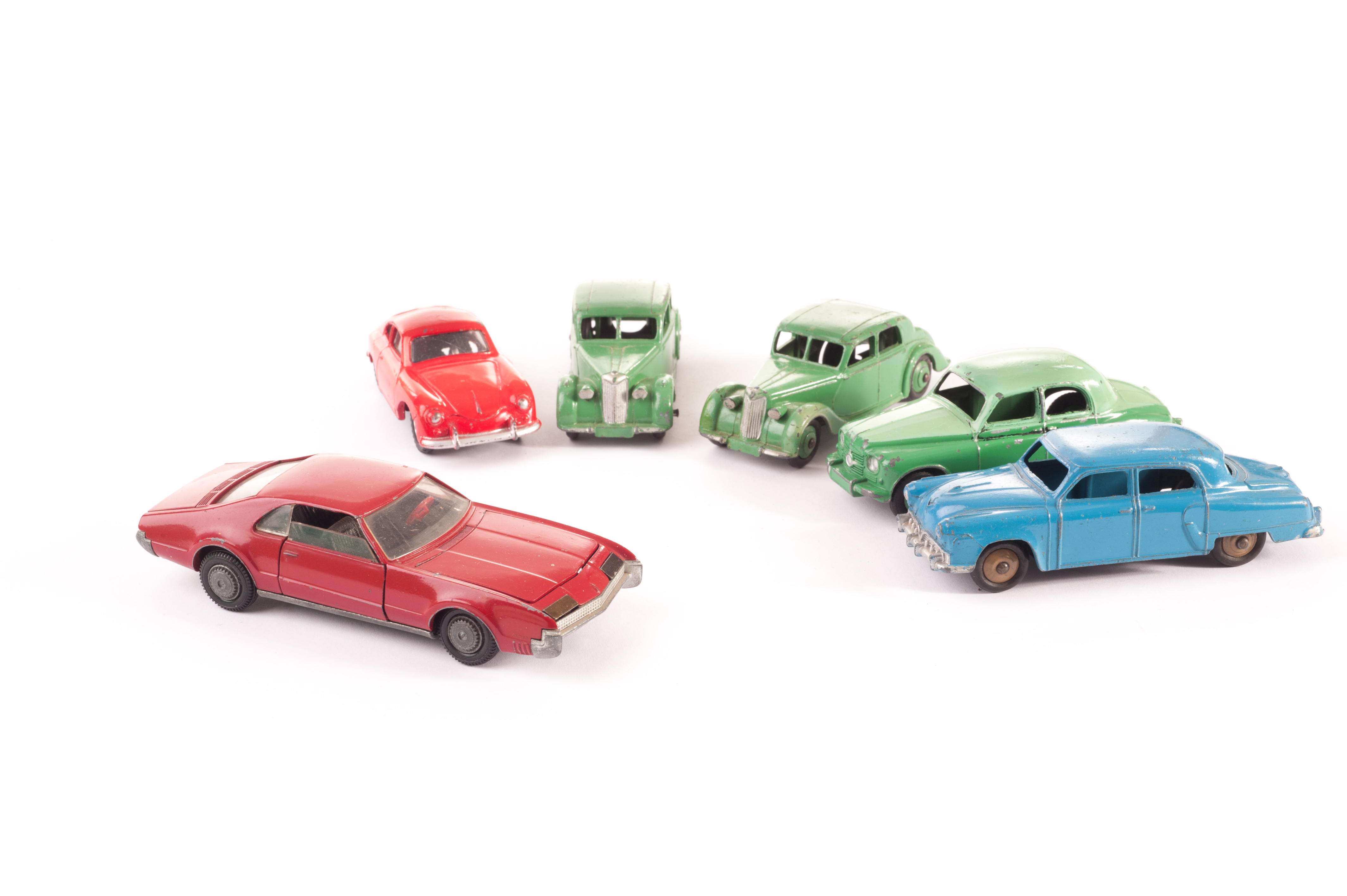 Dinky Toy Cars, 182 Porsche 356A, red body, spun hubs, 172 Studebaker, blue body, fawn hubs, 40a