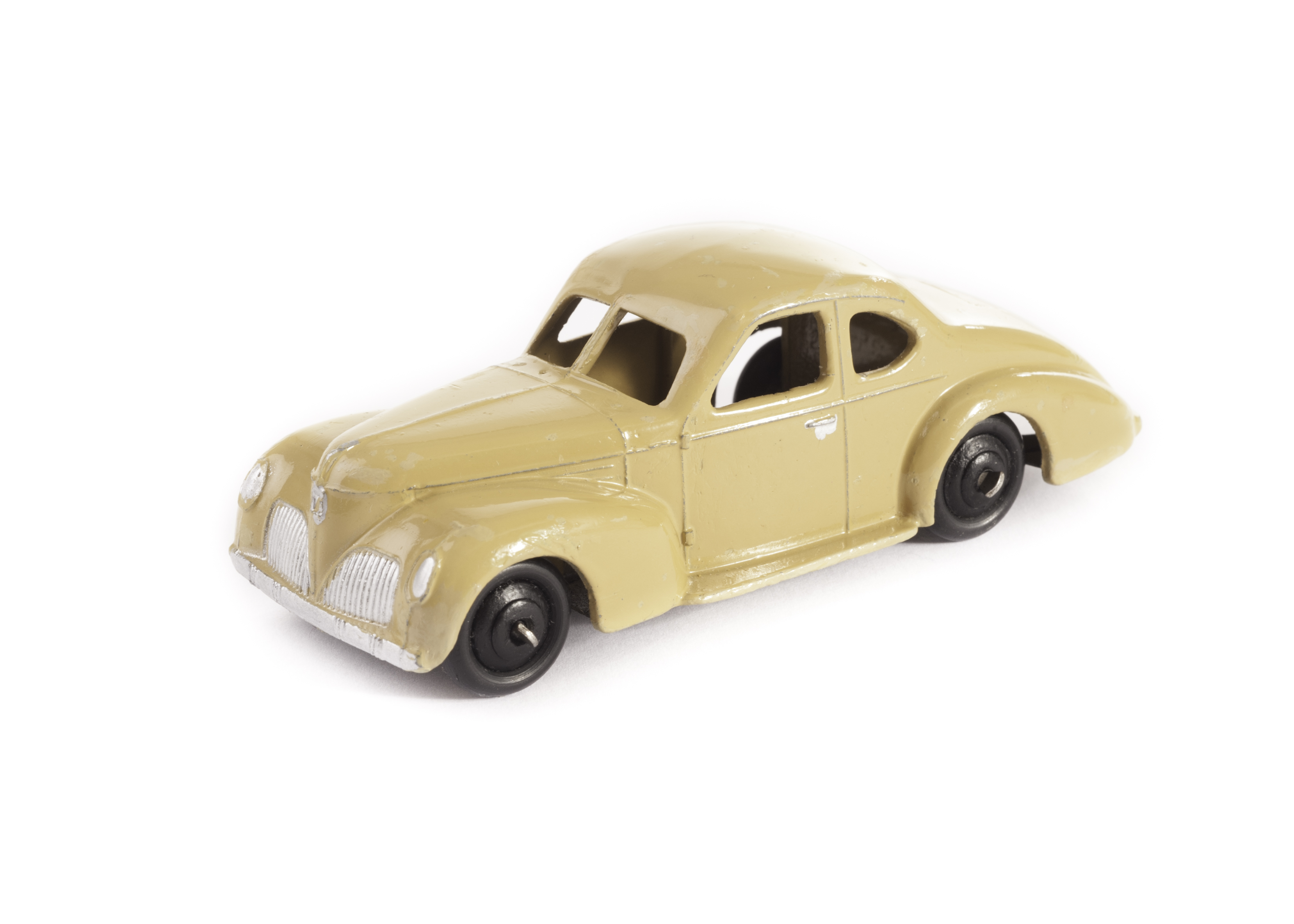 A Dinky Toys 39f Studebaker State Commander, beige body, black ridged hubs, G-VG, retouching