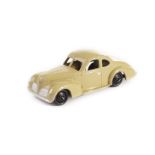 A Dinky Toys 39f Studebaker State Commander, beige body, black ridged hubs, G-VG, retouching