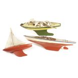 A kit-built plastic model of the clipper Thermopylae, hull painted in green and gold, with white-