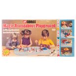 A Corgi Magic Roundabout Playground, comprising base with Train, Roundabout, Figures, Trees and