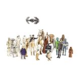 Loose Vintage Star Wars Figures, including Yoda, Greedo, Ugnaught, Power Droid, AT-AT Driver, Leia