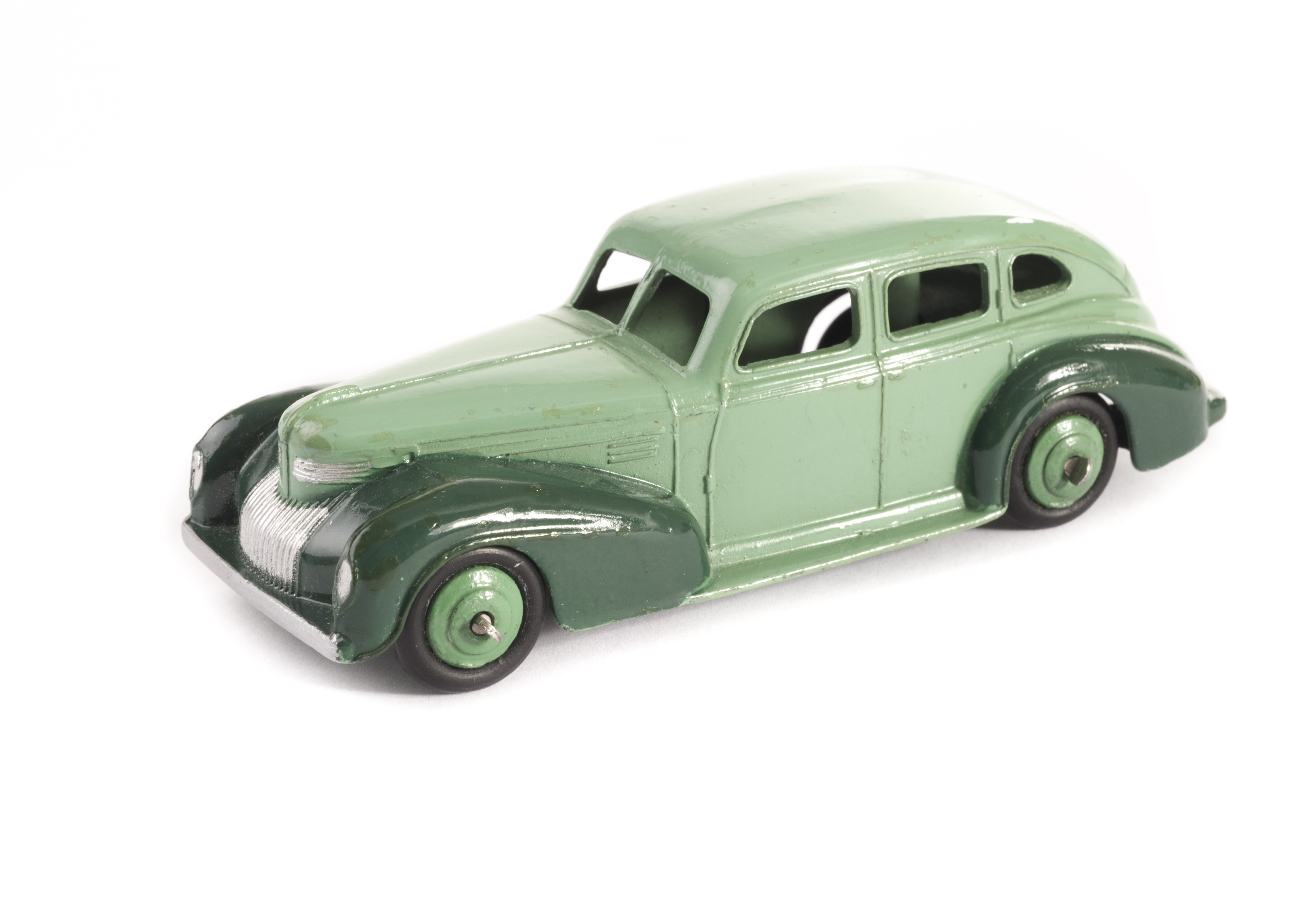 A Dinky Toys US Issue 39eu Chrysler Royal Sedan, two-tone green body, light green ridged hubs, VG-E,