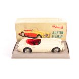 A Tri-ang Minic 1:20th Scale battery operated Austin Healey, in off-white plastic with full size