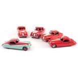 Dinky Toys 157 Jaguar XK120, five examples, first bright red body, spun hubs, M tyres, second dark