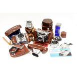 Voigtländer Cameras: a Prominent with 3 lenses and accessories together with a Vitessa with Ultron