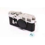 A Leica M3 Rangefinder Body, chrome, serial no. 707620, with various engravings including 'Leitz-