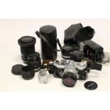 Olympus OM2 with Lenses: chrome body with 5 Zuiko lenses and accessories (a lot)