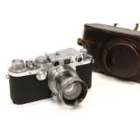 A Leica IIIf Black Dial Rangefinder Camera, serial no. 535863, with Leitz Summitar f/2 50mm lens, in