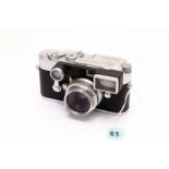 A Leica M3 Rangefinder Camera, chrome, serial no. 10442346, with Leitz Summaron f/2.8 35mm lens,