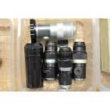 Various Leitz Lenses: quantity of five Leitz f/4.5 135mm lenses, all with various engravings