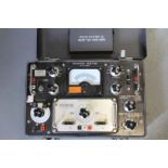 An Avo Transistor Analyser, built in a protective case with military markings