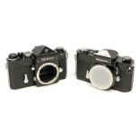 A Nikon F SLR Body, black, serial no. 6951635, together with a Nikon Nikkormat FTn body, black,