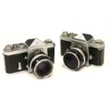 Two Nikon F SLR Cameras, chrome, serial nos. 6458179 / 6824537, with Nikkor-S f/2 50mm and Nikkor-