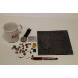 Leica Promotional Items, a quantity of Leitz badges with a wall plaque and other items (a lot)