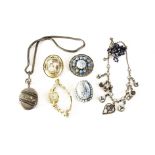 A small group of costume jewellery, including an oval silver plated locket, a micro mosaic