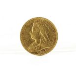 A Victorian gold sovereign coin, with Old Head, dated 1899, VF