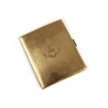 A 9ct gold cigarette case, rectangular curving form bearing engraved family crest of ship with