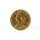 A Victorian gold sovereign coin, with Old Head, dated 1899, VF