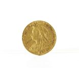 A Victorian gold sovereign coin, with Old Head, dated 1893, VF