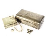 A 1918 silver cigarette box, marked Chester, together with a smaller silver plated example (2)