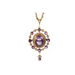 An amethyst and seed pearl pendant brooch necklace, the large central amethyst surrounded by a
