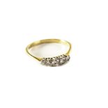 A five stone diamond ring, having graduated brilliant cut stones set in 18ct gold 2g