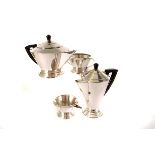 A silver plated Art Deco four piece tea and coffee set, comprising tea pot, coffee pot, milk/cream