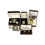 A collection of various silver and costume jewellery, including a silver and hardstone brooch, a