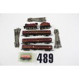 Lima N Gauge LMS 4F locomotive and rolling stock: comprising an unboxed maroon locomotive no 4683