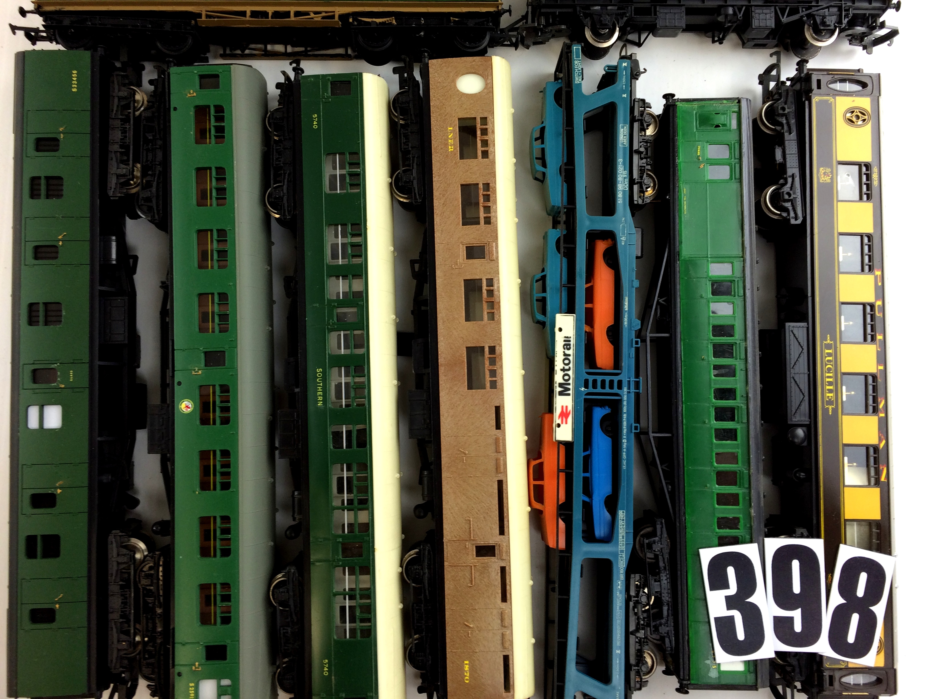 A collection of OO gauge Rolling Stock and Buildings by Hornby Lima and others: including 5 SR green