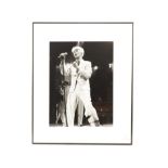 David Bowie: Framed & glazed live performance silver print taken at Madison Sq Garden 1983, signed