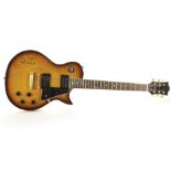 Carlos Santana: A unbranded electric guitar signed in black felt pen Carlos Santana sold with a