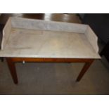 A good Victorian pine marble top wash stand, with galleried back, surmounting a two drawer base on