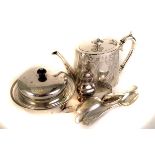 A silver rimmed cut glass water jug, AF, together with a silver plated muffin dish, a teapot and