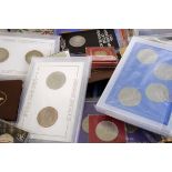 A large collection of Isle of Man coin sets, together with other various coin sets (qty)