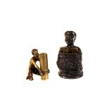 A vintage brass lighter in the form of a faun, together with an oriental style example (2)