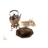 A large collection of silver plated items, comprising teapot, tureens and covers, toast rack, dishes