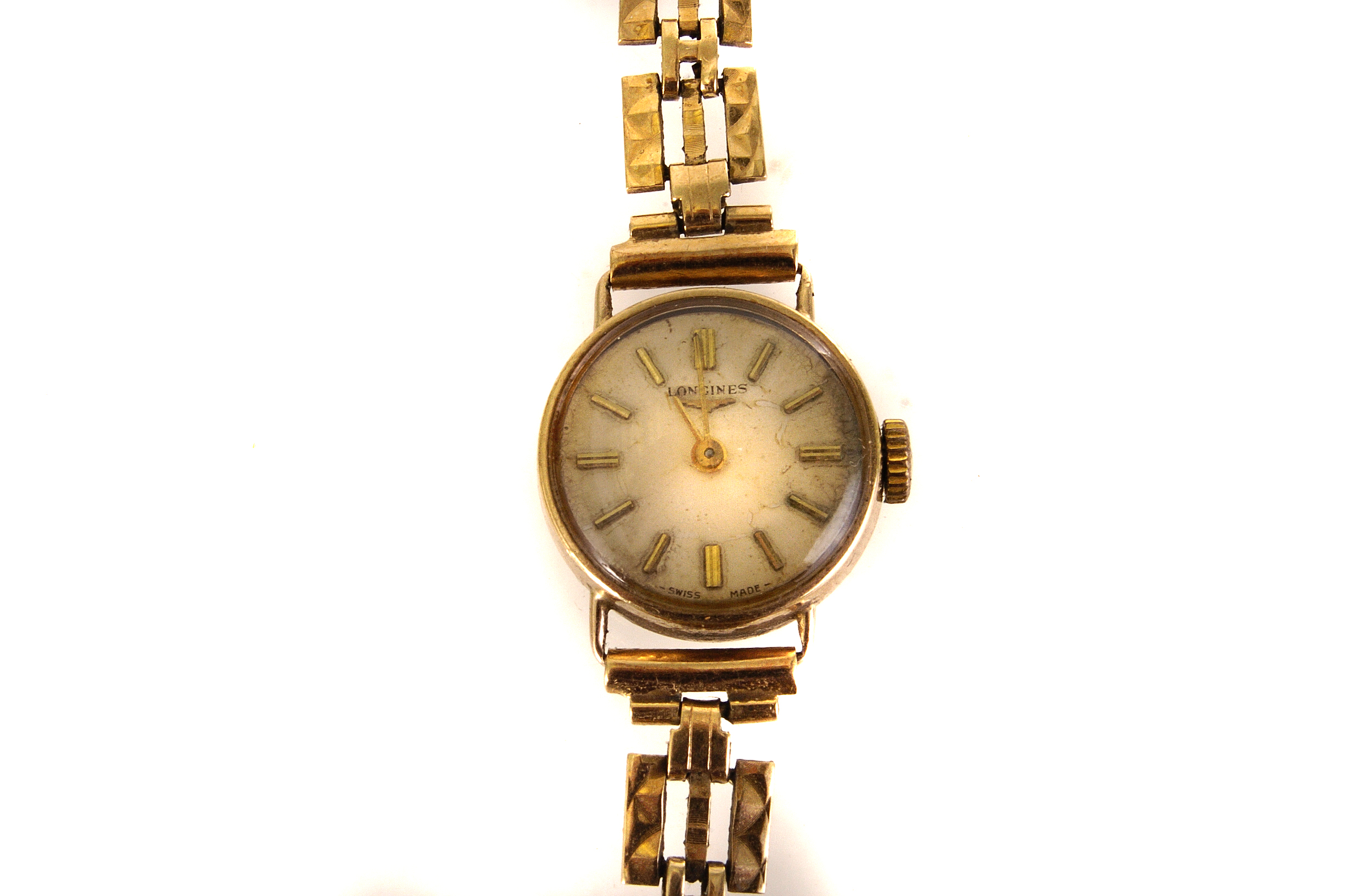 A 9ct gold lady's Longines wristwatch, having baton numerals, on linked bracelet