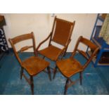 A pair of elm seat country kitchen chairs, together with a folding chair