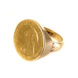 A half sovereign gents signet ring, dated 1895, mounted on a 9ct gold band