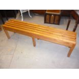 A pair of pine benches, with rail seats (2)