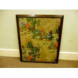 A 1930s framed and glazed embroidery, depicting a floral garden scene, approx 59cm by 48cm, frame