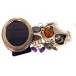 A small collection of silver jewellery, including a mosaic brooch, golf cufflinks, an amber style