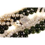 A Chinese jadeite or hardstone bead necklace, together with a freshwater pearl necklace and a faux