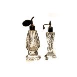 A selection of cut and moulded glass scent bottles and atomisers, all of various design, some with