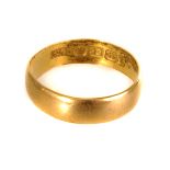 An 18ct gold wedding band, size J, approx 2g